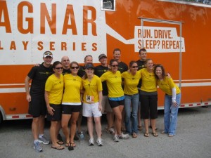 team-in-front-of-truck team-in-front-of-truck